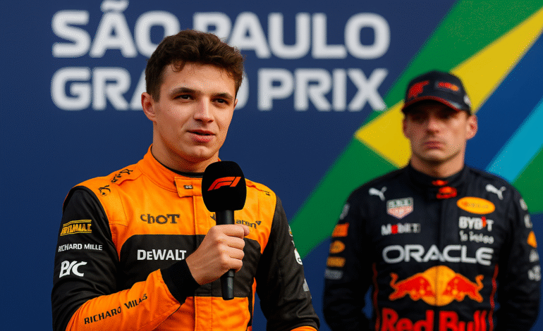 Lando Norris speaks at a press conference after winning the 2025 São Paulo Grand Prix, wearing his orange McLaren F1 suit, while Max Verstappen of Red Bull stands behind him against a backdrop showing the Brazilian flag colors and race branding