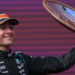 George Russell celebrating after winning the Australian Grand Prix as Mercedes secures a 1-2 finish.