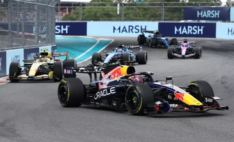 Formula 1 cars and engine graphics highlighting the new 2027 regulations featuring a revised 50-50 power balance system.