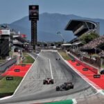 Formula 1 cars race through the Circuit de Barcelona-Catalunya during the Spanish Grand Prix weekend with championship battle updates in focus.